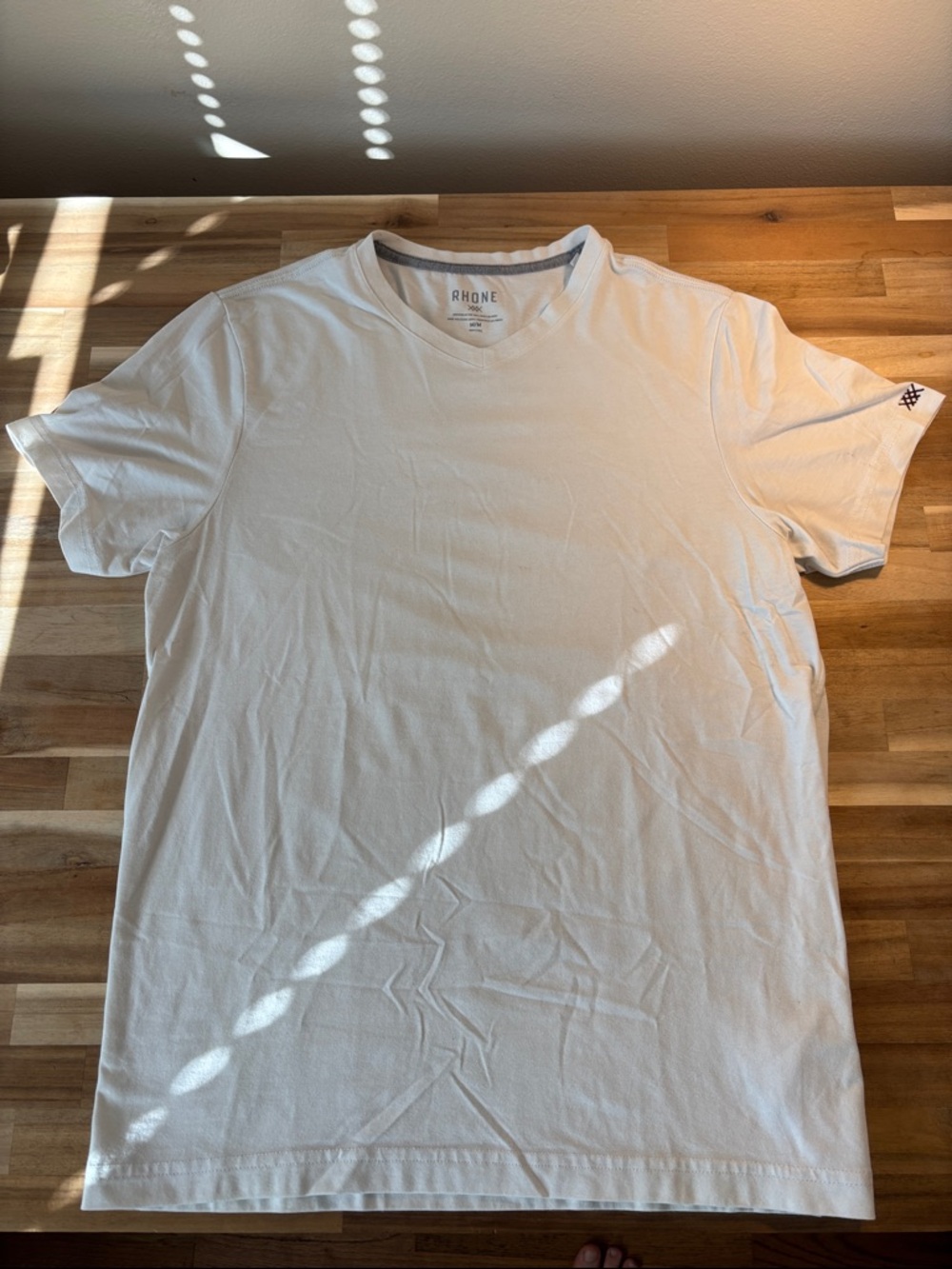 RHONE Men's V-Neck Short Sleeve Tee in White